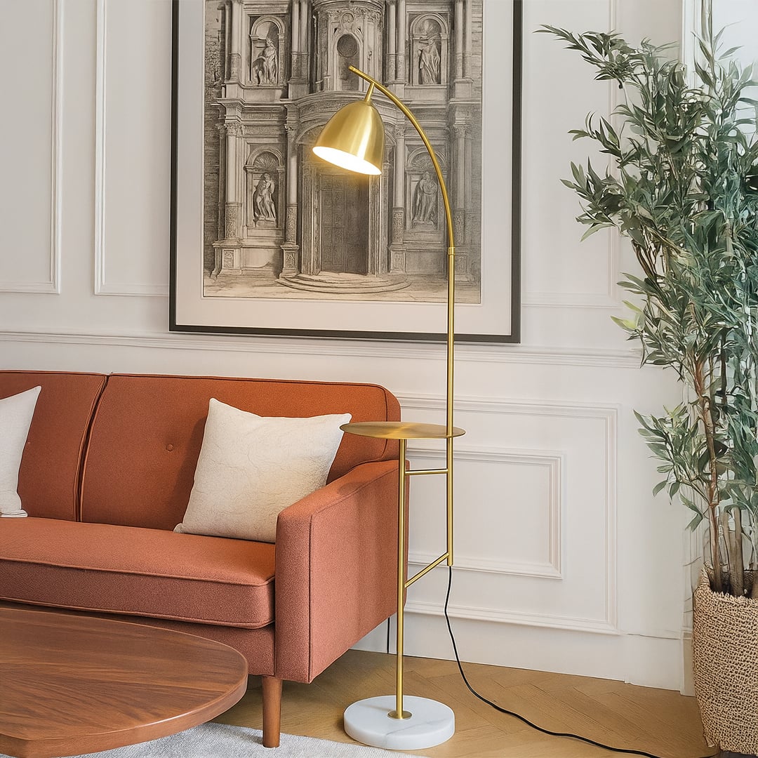 Minimal floor lamp with metal stand and angled shade placed beside orange sofa adding focused lighting to stylish living room decor.