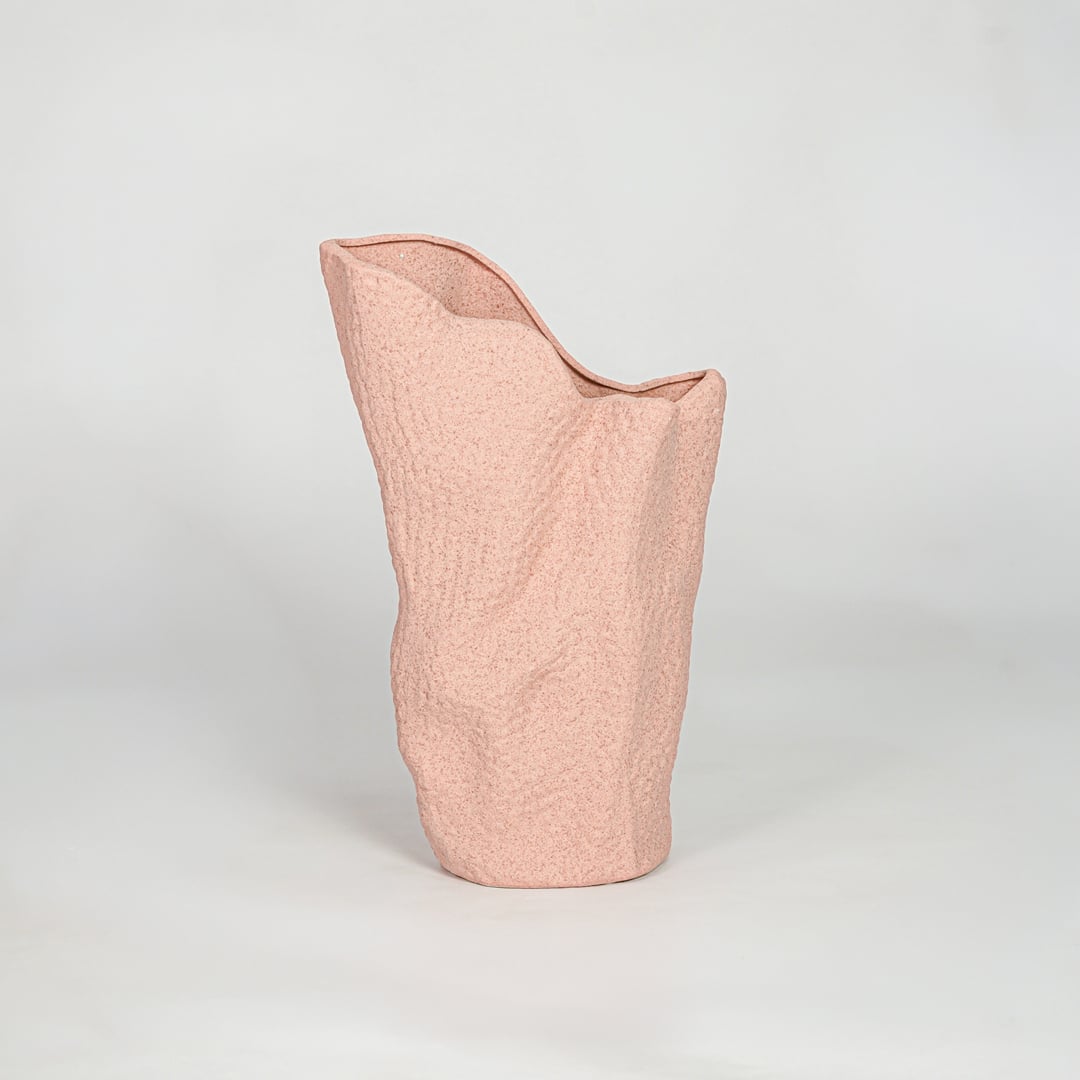 Pink ceramic modern decorative designer vase isolated on clean white background stylish home decor flower vase for shelf table use.
