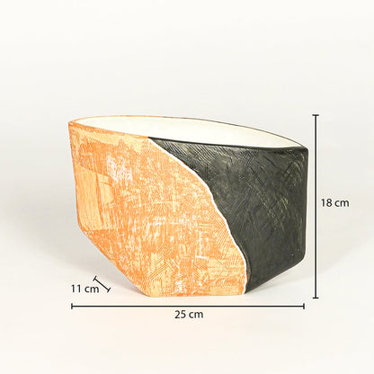 Orange and black ceramic decorative planter showing 18 cm height 25 cm width and 11 cm depth suitable for table shelf or console placement.