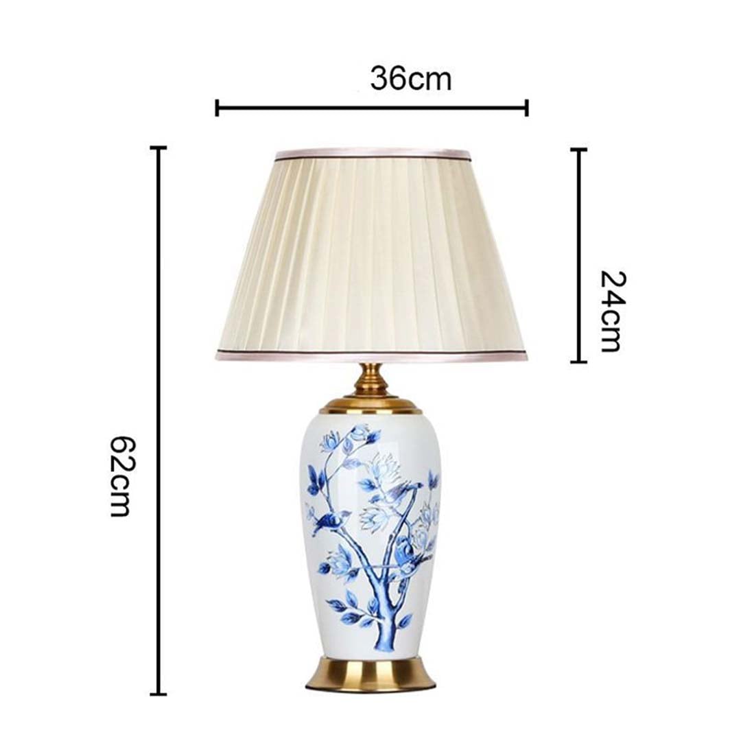 Designer ceramic and metal table lamp measuring 62 cm in height and 36 cm in width with a 24 cm shade perfect for adding timeless charm to interiors.