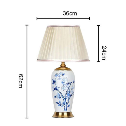 Designer ceramic and metal table lamp measuring 62 cm in height and 36 cm in width with a 24 cm shade perfect for adding timeless charm to interiors.