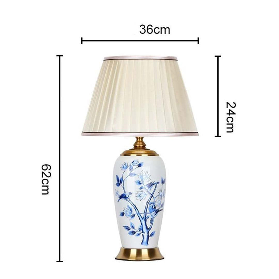 Designer ceramic and metal table lamp measuring 62 cm in height and 36 cm in width with a 24 cm shade perfect for adding timeless charm to interiors.