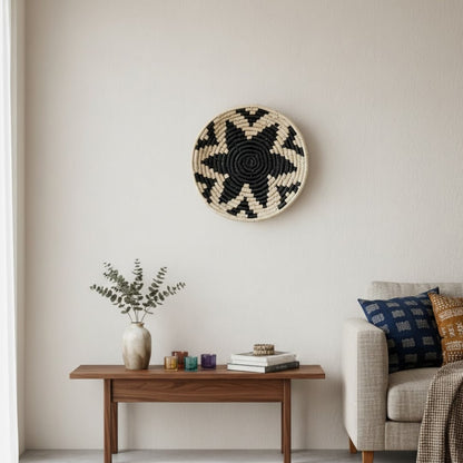 Woven wall basket styled above wooden console with decor accents creating warm natural focal point for modern living room Decor.