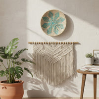 Mint green woven wall basket displayed above a sofa for elegant bohemian wall decor and modern home interiors.