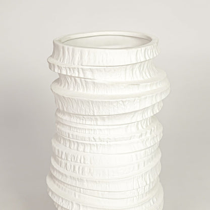 White ceramic decorative vase with detailed layered texture perfect for elegant dried floral display and modern interior decor.