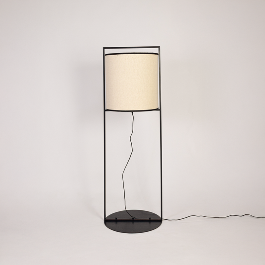 toby metal floor lamp light off white background