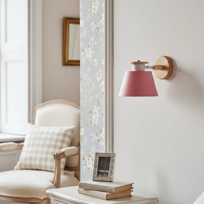 Modern pink metal wall light for stylish bedroom living room and luxury home decor styling spaces.