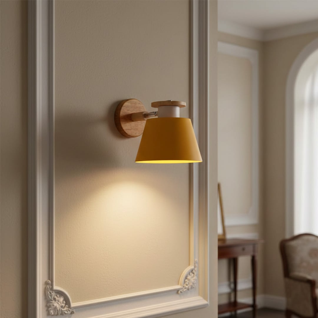 Modern mustard metal wall light with warm lighting for stylish bedroom and contemporary decor spaces.