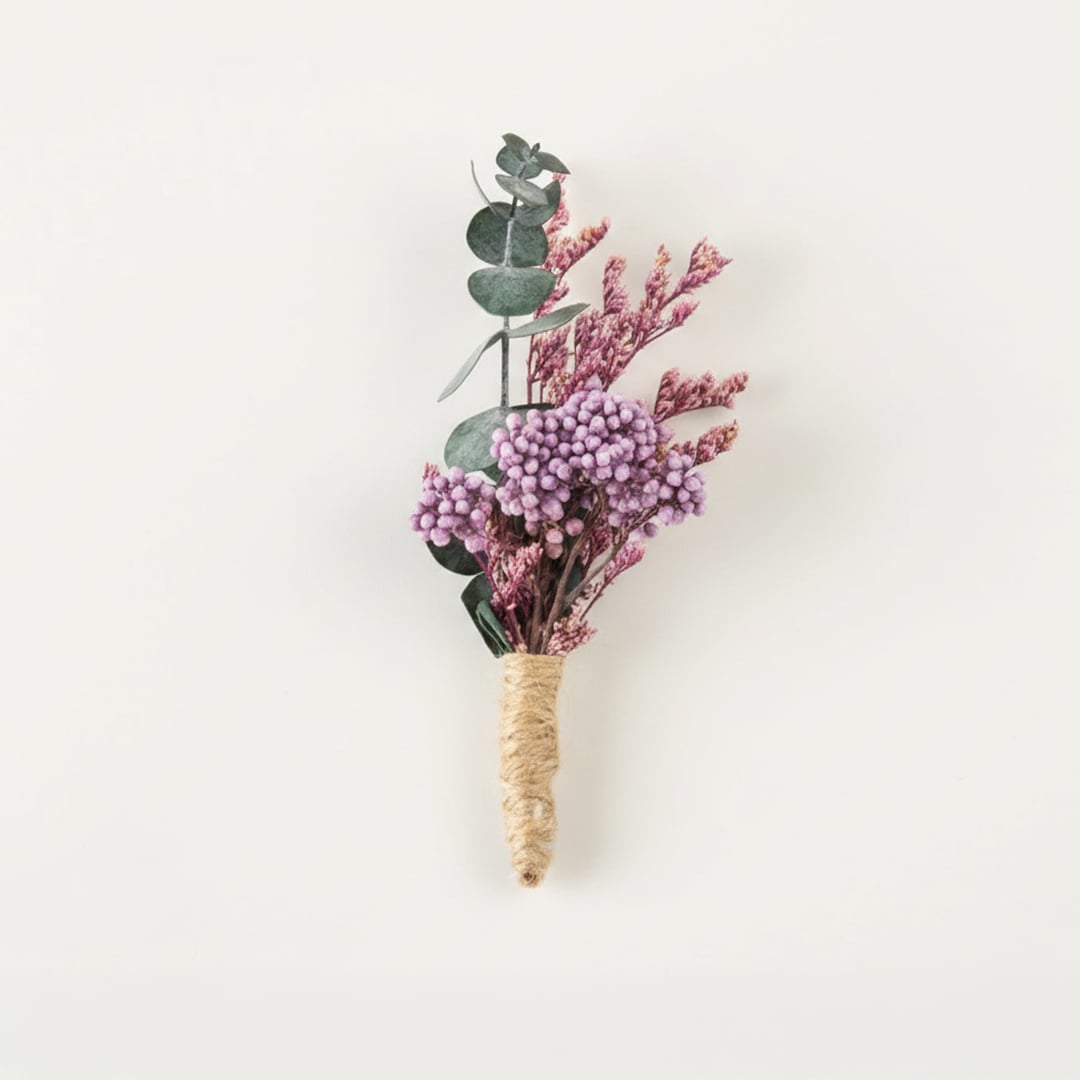 Dried floral stem bouquet with lavender buds eucalyptus leaves and pink accents on white background highlighting soft textures natural elegance and decor styling charm.