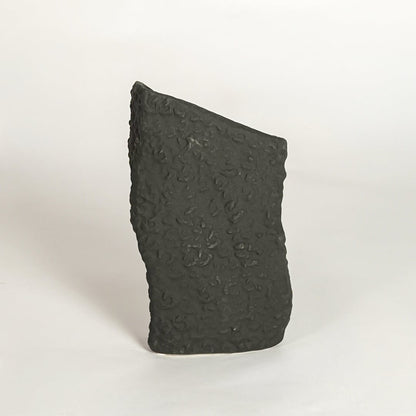 tombstone black ceramic vase white background