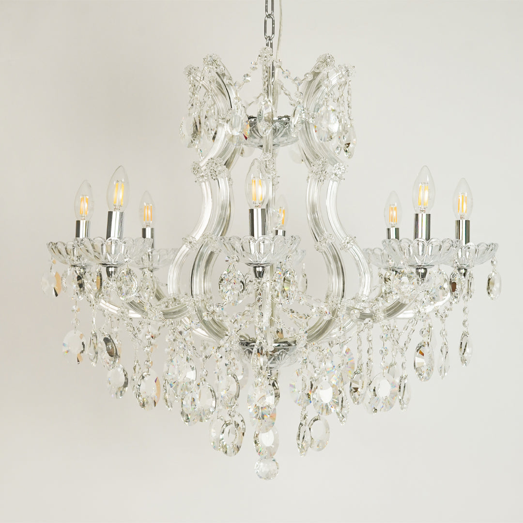 White background image of topaz cut-crystal chandelier for elegant dining room decor styling with unlit arms.