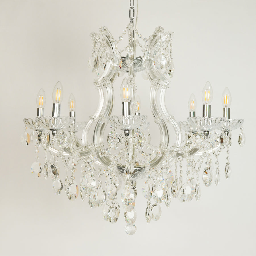 White background image of topaz cut-crystal chandelier for elegant dining room decor styling with unlit arms.