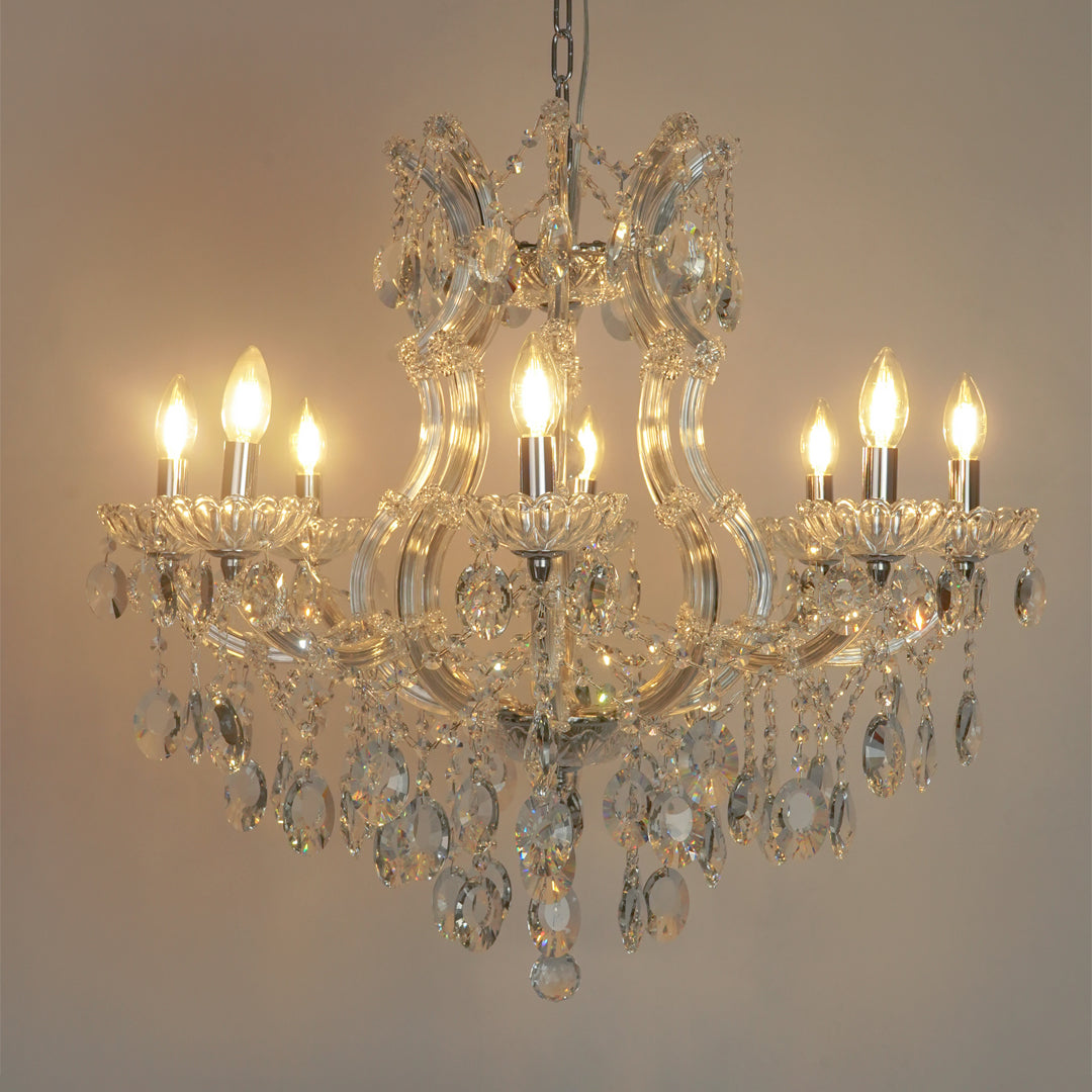 White background image of topaz cut-crystal chandelier for modern living room decor styling with a bright warm glow.