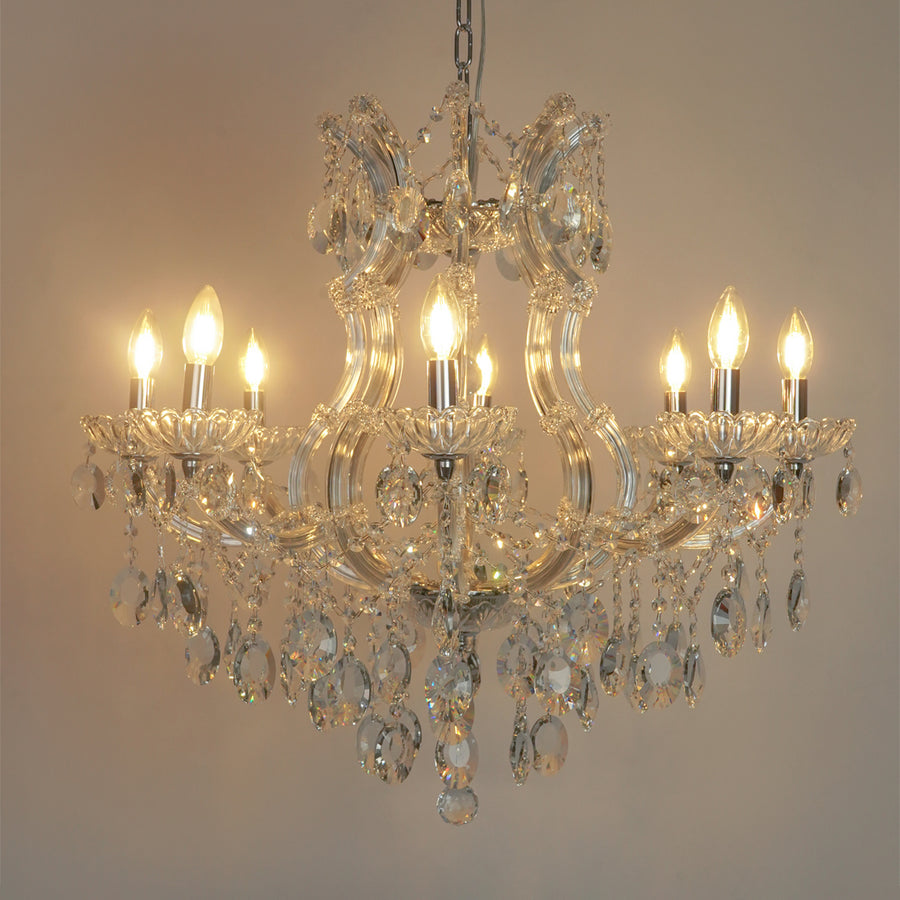 White background image of topaz cut-crystal chandelier for modern living room decor styling with a bright warm glow.