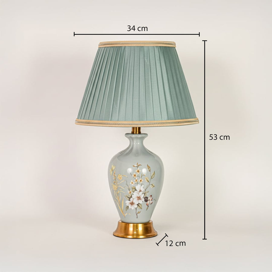 Sage green ceramic table lamp showing 53 cm height 34 cm shade width and 12 cm base size ideal for bedside placement.