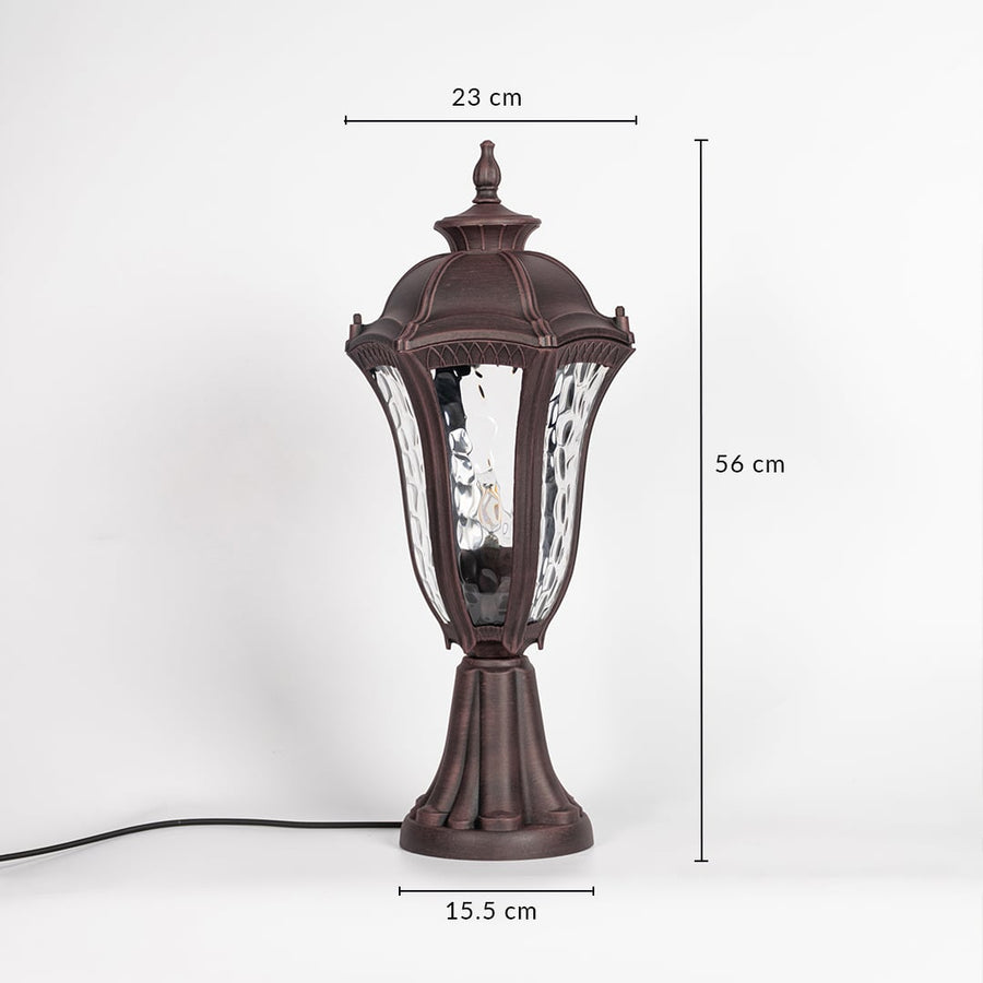 Antique brown pillar light with patterned clear glass measuring 56 cm height and 23 cm width ideal for outdoor pillar decor.