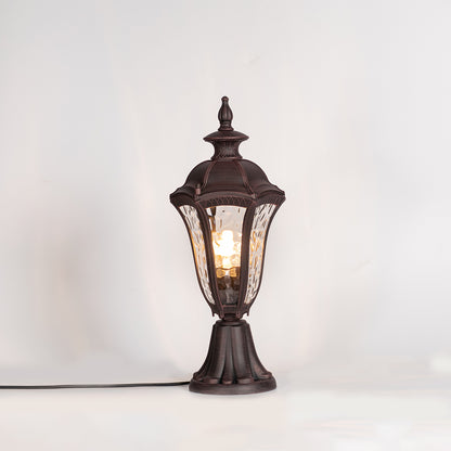 Vintage outdoor gate light with black metal frame and warm glass shade for elegant exterior decor use.