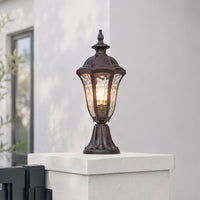 Vintage bronze metal outdoor gate pillar light for entrance fence garden and driveway with warm ambient lighting.