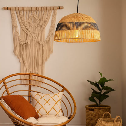 Natural jute pendant light with black detailing creating a rustic modern vibe perfect for cozy dining and living room interiors.