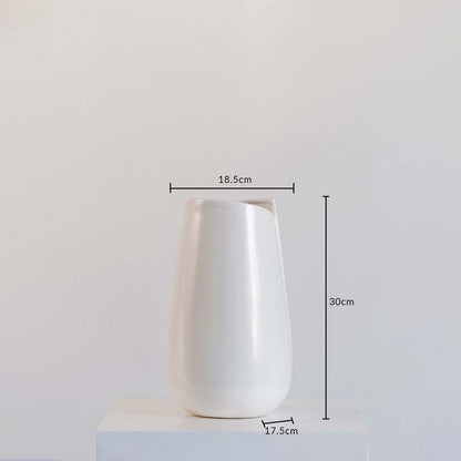 White ceramic vase shown with dimensions 30 cm height  18.5 cm width  and 17.5 cm depth  set against a clean white backdrop for clarity.