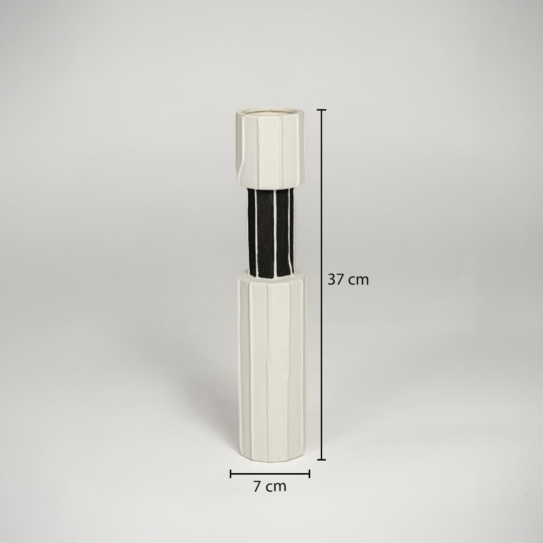 White metal and glass decorative candle holder measuring 37 cm height and 7 cm width ideal for modern table decor styling.