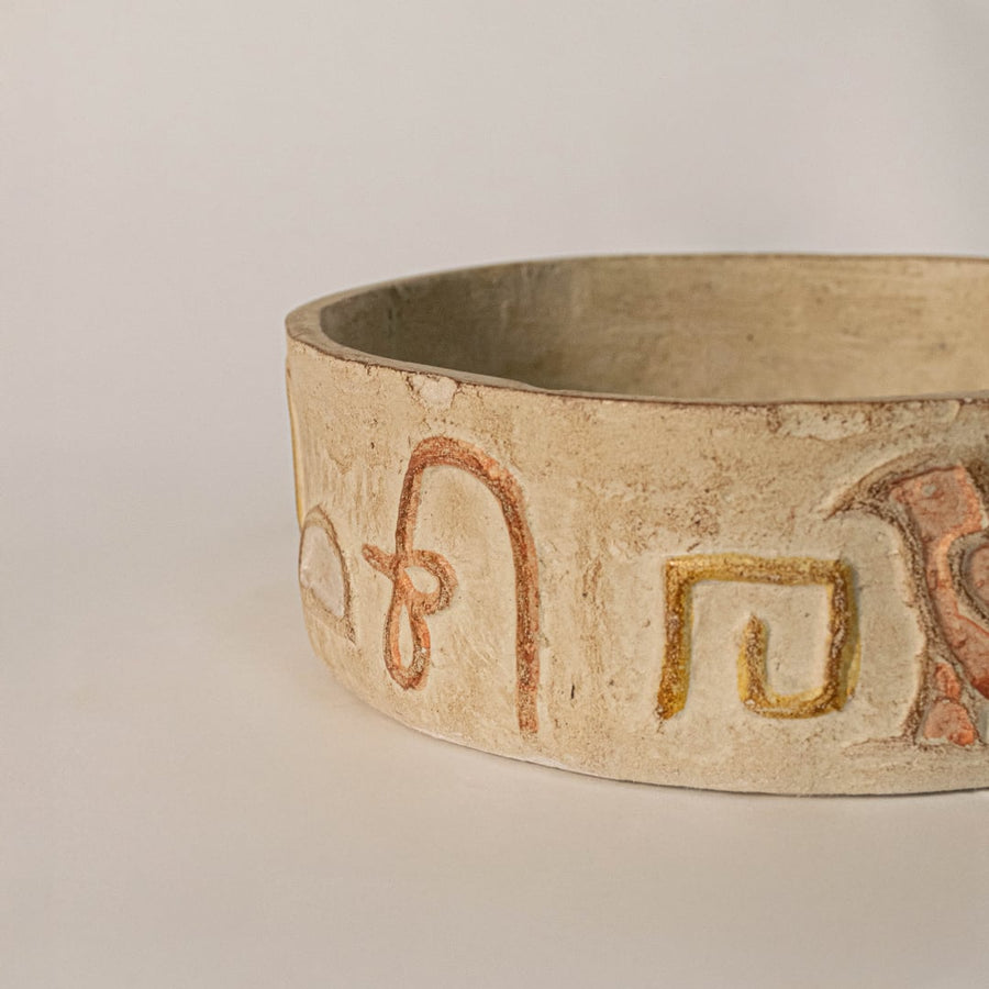 Detailed shot highlighting the natural stone finish carved motifs and wooden lid of the hieroglyph box.