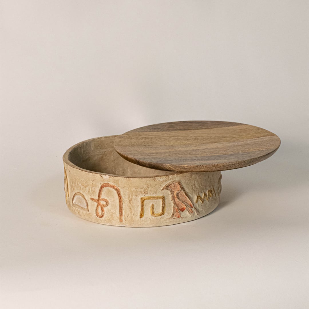 Hieroglyph box on plain white background highlighting engraved Egyptian motifs and smooth handcrafted ceramic finish.
