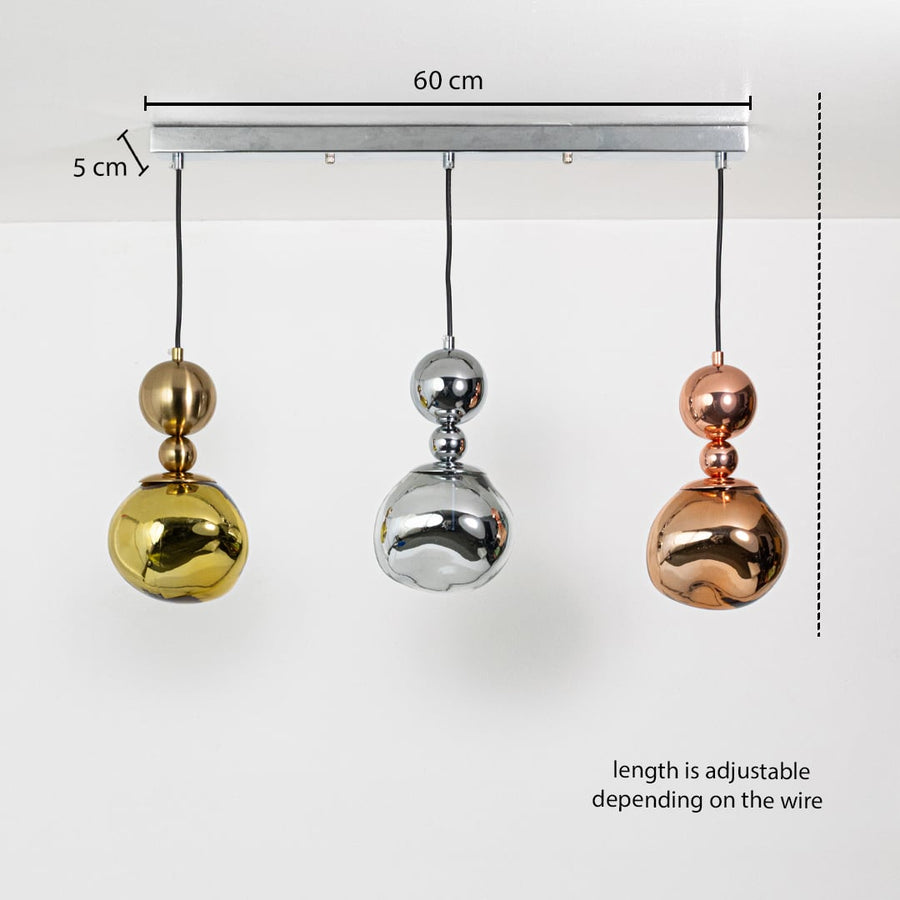 Adjustable metallic pendant trio with gold silver and copper sculpted shades shown with a clear hanging height guide for accurate visual reference.