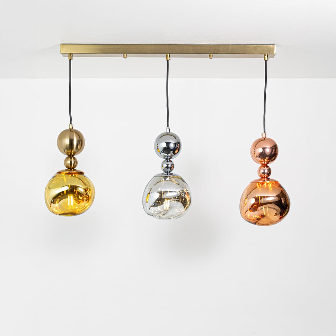 Amber silver and copper glass pendant lights showcasing stylish designs for contemporary home decor.