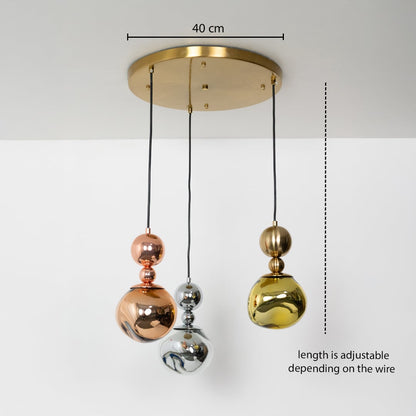 Triple metallic globe pendant light dimension image with adjustable length and 40 cm canopy for luxury dining placement.