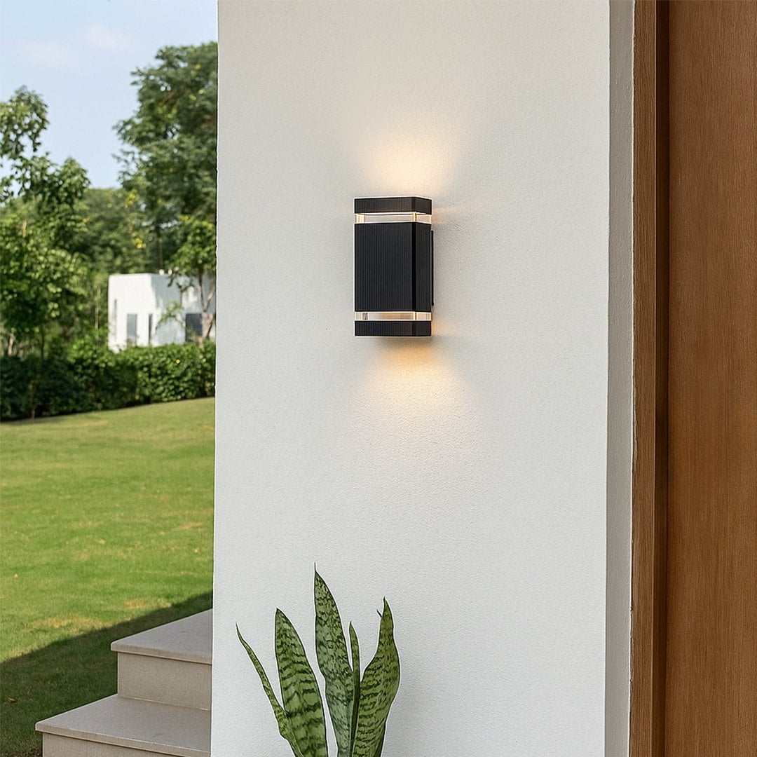 Modern rectangular black wall light adding a sleek accent to contemporary walls with subtle up and down glow.