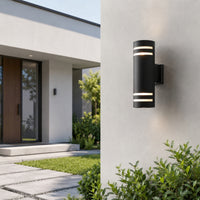 Modern black metal LED wall light for porch entrance driveway and exterior walls with elegant warm illumination.