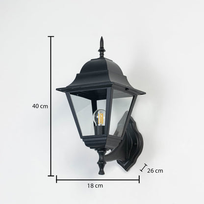 Black wall-mounted outdoor lantern measuring 40 cm height and 26 cm depth featuring elegant shape and transparent glass design.