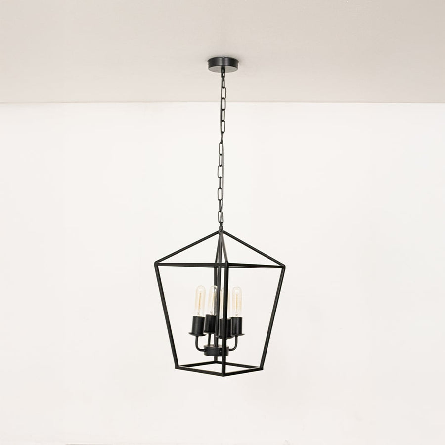 Black metal pendant light with clear glass bulbs displayed with lights off on a clean white background showcasing its sleek geometric frame.