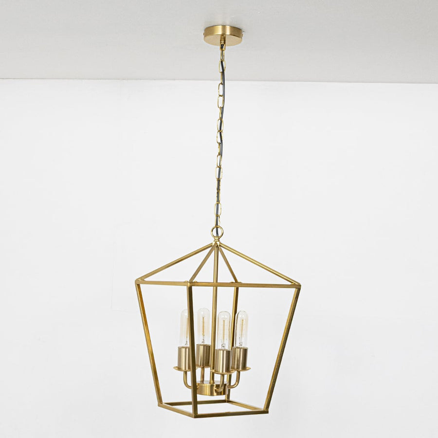 Gold metal pendant light with clear bulbs displayed with lights off on a clean white background showcasing its modern geometric frame.