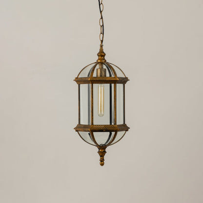 A classic bronze hanging lantern shown on a white background with the light off emphasizing its glass chamber metal frame and decorative vintage inspired structure.