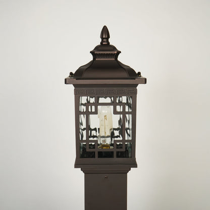 Close view of outdoor lantern pole light with glass enclosure showcasing durable weather resistant classic lighting design.
