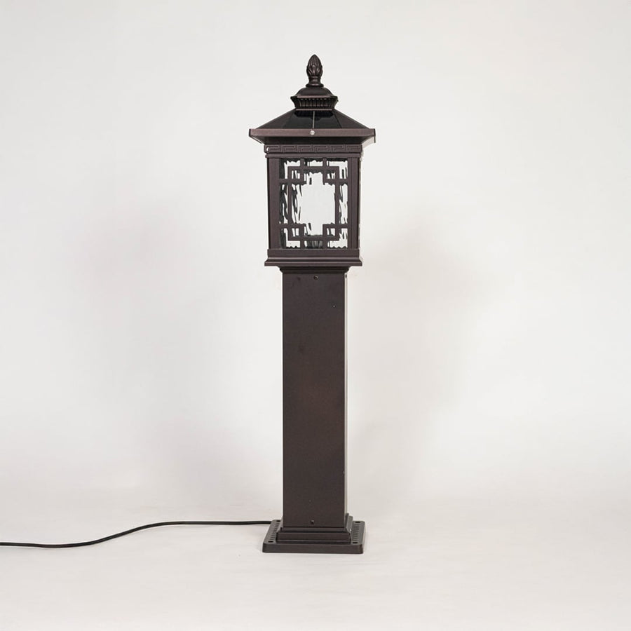 Elegant black pillar lamp post with frosted glass shade displayed off on plain white background.