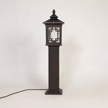 Outdoor post lantern in black metal with glass panels displayed on white background highlighting classic garden lighting style.