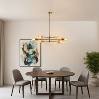 Modern dining room styled with gold linear chandelier above wooden table creating warm ambient lighting and refined contemporary Decor.