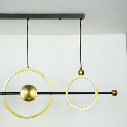 Minimal hanging pendant light with dual gold circular rings and white globe shade on clean background perfect for modern home decor lighting.