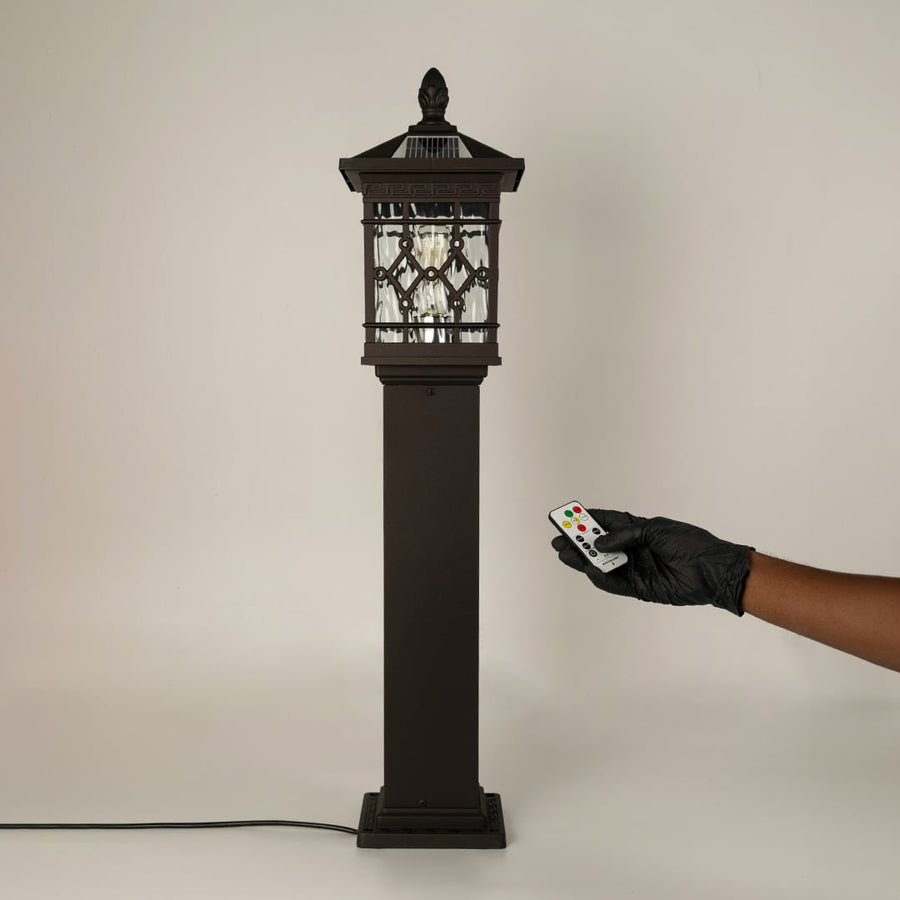 Black solar outdoor gate light with remote control for modern exterior decor styling use.