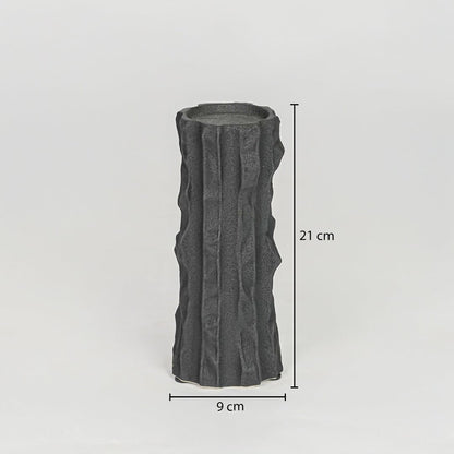 Black ceramic decorative candle holder size 11 cm height 9 cm length modern textured candle stand dimension reference image.