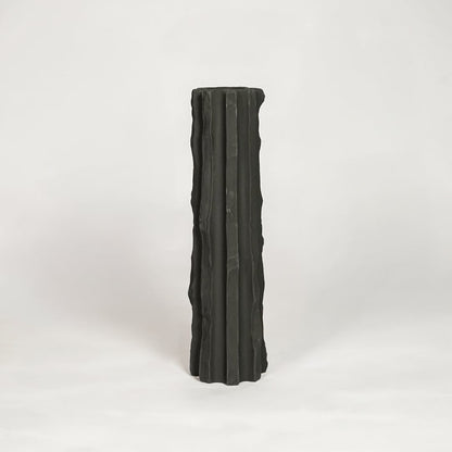 Modern black ceramic tall decorative floor vase with sculpted fluted design ideal for living room corner and stylish home decor.