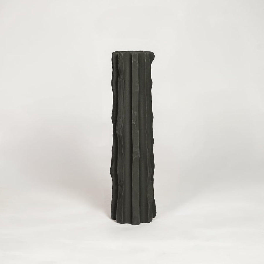Modern black ceramic tall decorative floor vase with sculpted fluted design ideal for living room corner and stylish home decor.