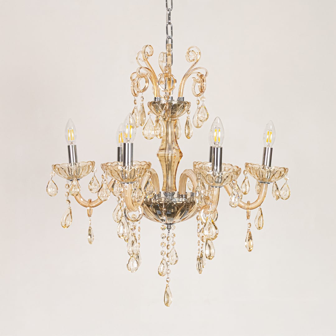 Golden crystal chandelier displayed on white background ideal for classic warm interior ceiling styling.