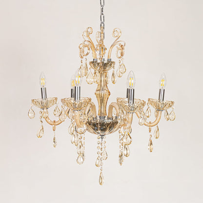 Golden crystal chandelier displayed on white background ideal for classic warm interior ceiling styling.
