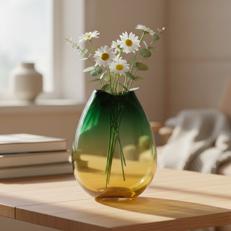 Green and amber glass vase styled on living room table modern decorative glass accent for shelf console or center table styling.