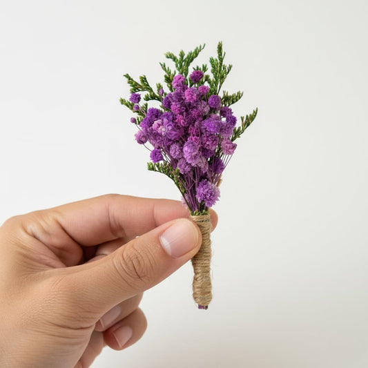 Handheld dried flower bouquet with vibrant purple florals wrapped in jute twine perfect for modern table and shelf Decor.
