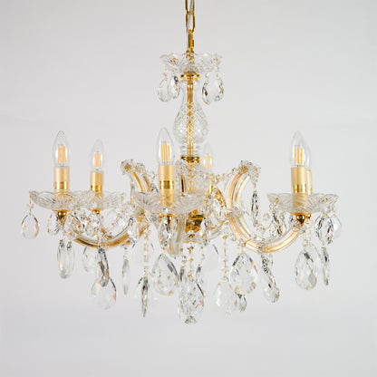 White background image of elegant crystal chandelier for elegant dining room decor styling with unlit crystal arms.